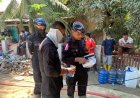 Polri Salurkan Air Bersih dan Bagikan Masker untuk Warga Terdampak Banjir di Nagan Raya